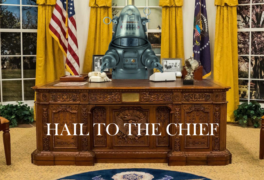 A picture of Robby the Robot seated behind the  Resolute Desk in the Oval Office.